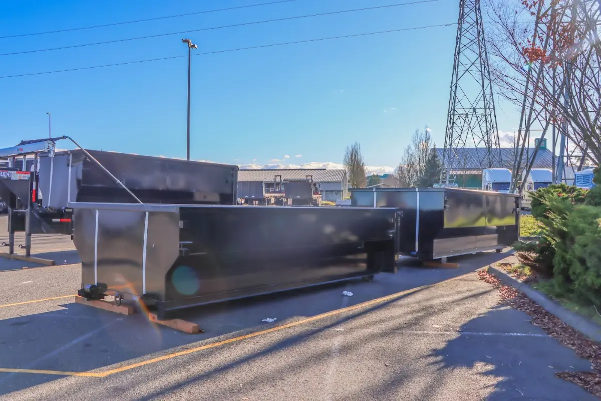 Roll-off dumpster ready for waste disposal at job site for Yard Waste Dumpster Rental in Napoleon